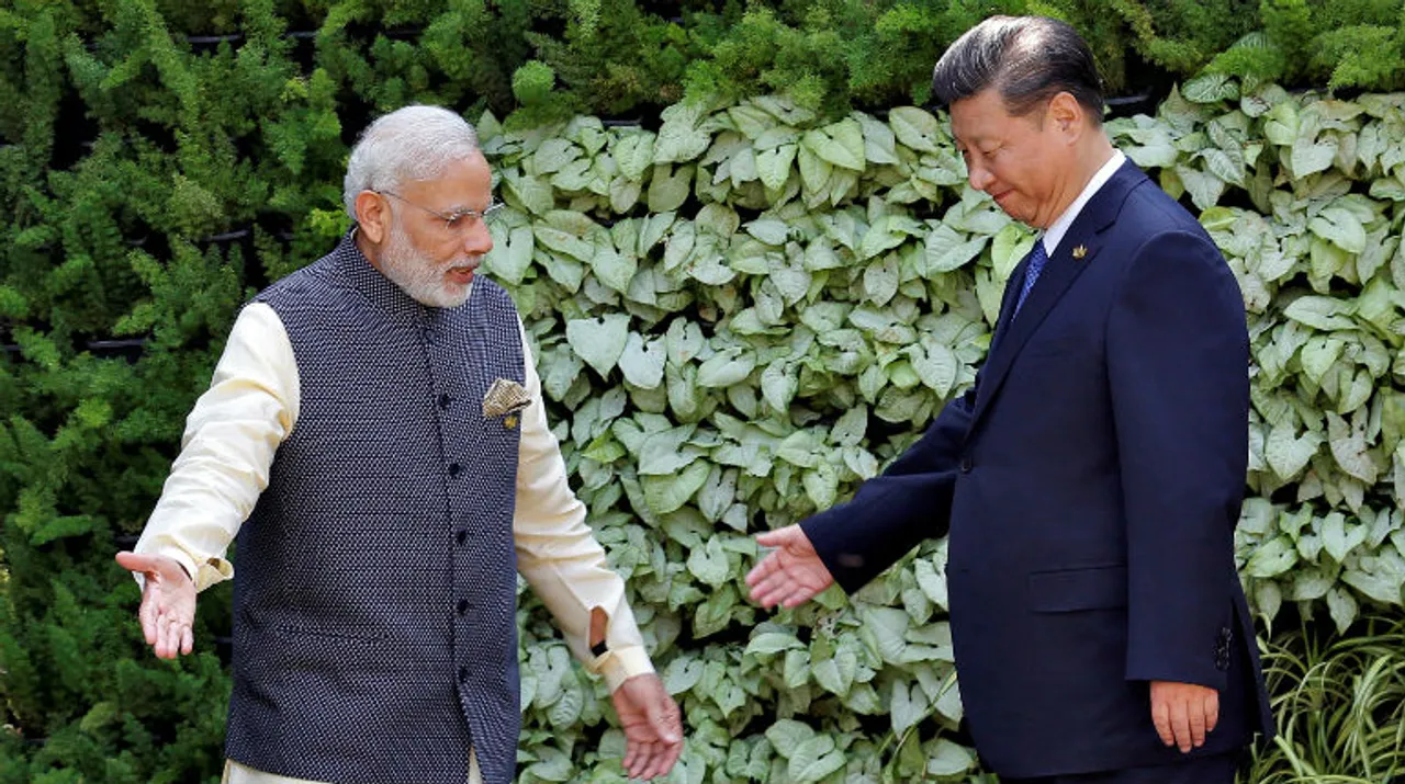  Modi-Xi-meeting-Reuters Photograph:(Reuters) 