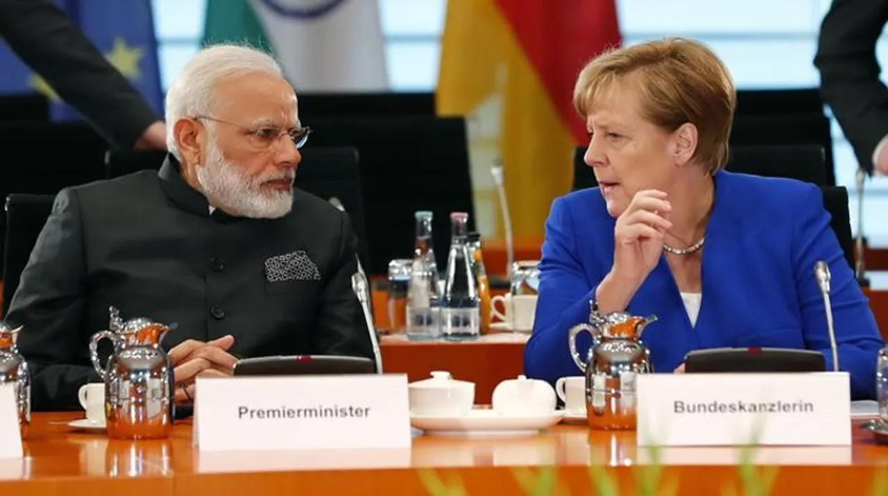  Modi Merkel Photograph:(Reuters) 