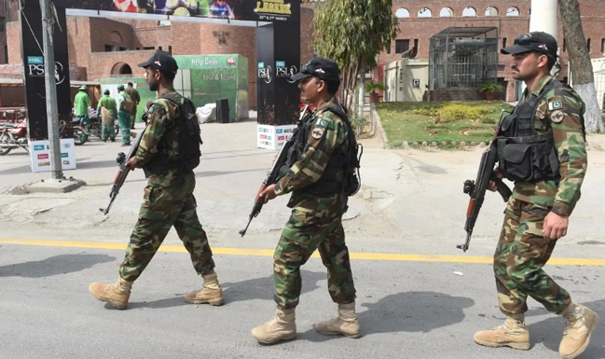 Pak soldiers patrol Gaddafi Cricket Stadium Photograph:(AFP) 