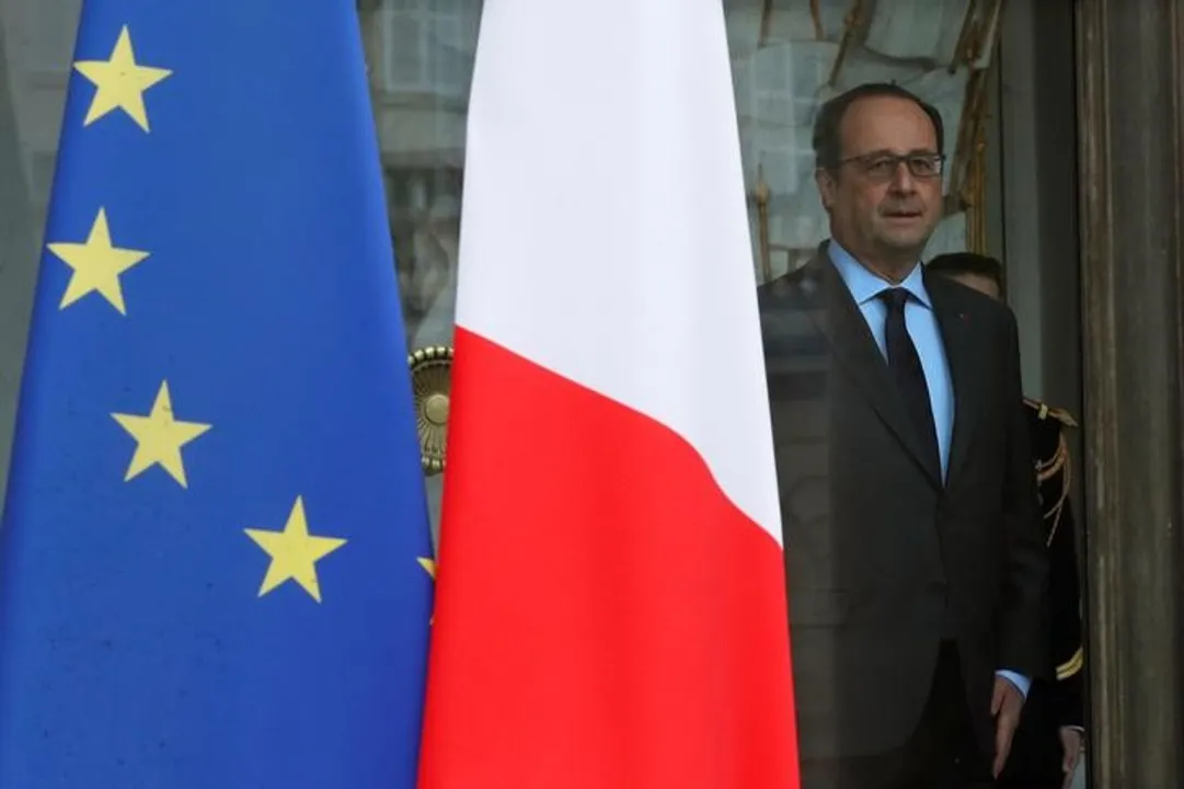  French President Francois Hollande is seen at the entrance of the Elysee Palace following the weekly cabinet meeting in Paris Photograph:(Reuters) 