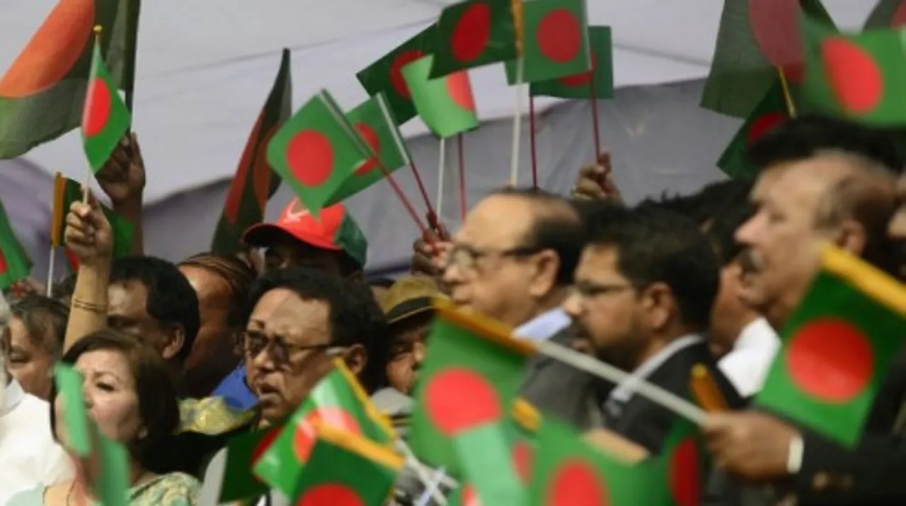  A file photo of people waving Bangladesh flag. Photograph:(AFP) 