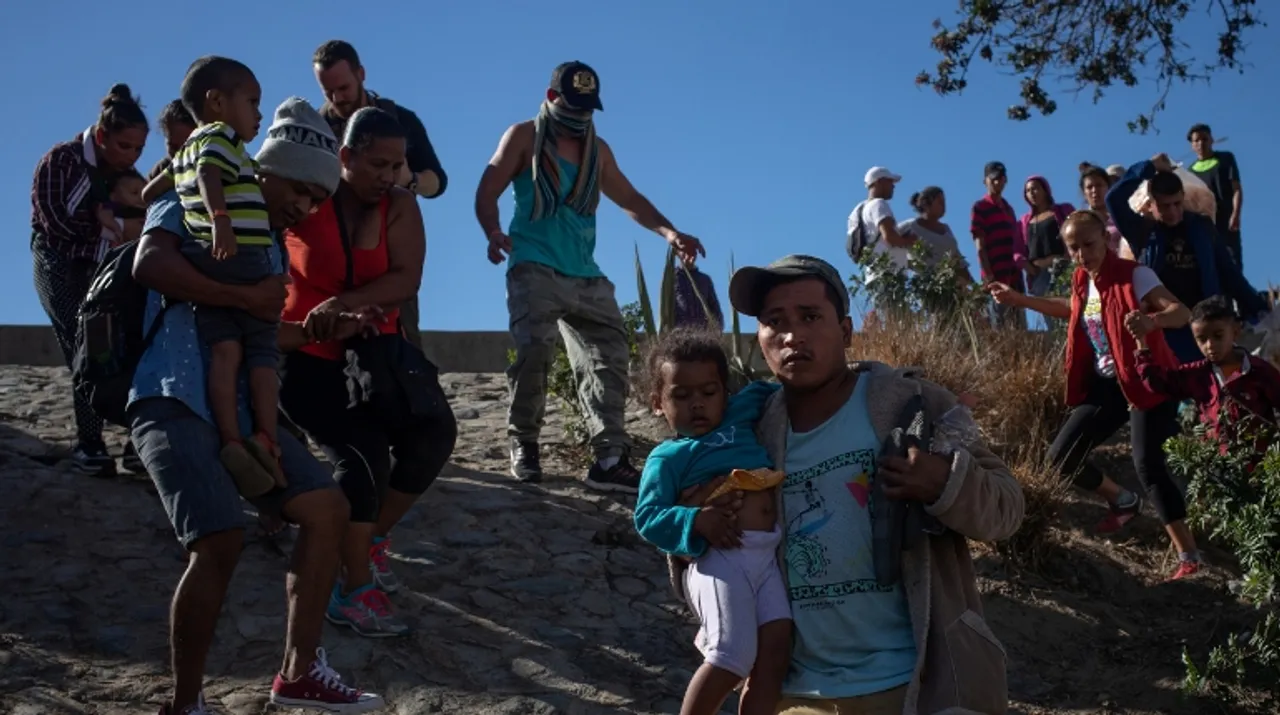  Migrant families Photograph:(Reuters) 
