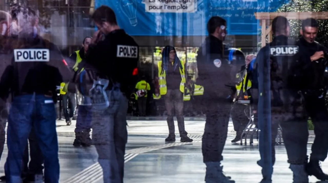  Protestors wearing yellow vests (gilets jaunes) occupy the Hotel de region in Lyon, southeastern France. Photograph:(AFP) 
