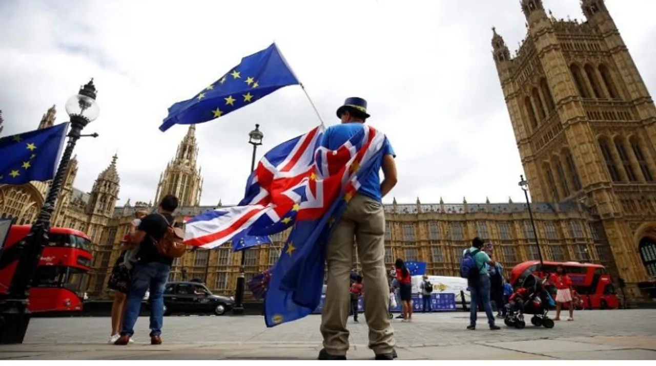  Anti-Brexit demonstrators wave EU and Union flags  Photograph:(Reuters) 