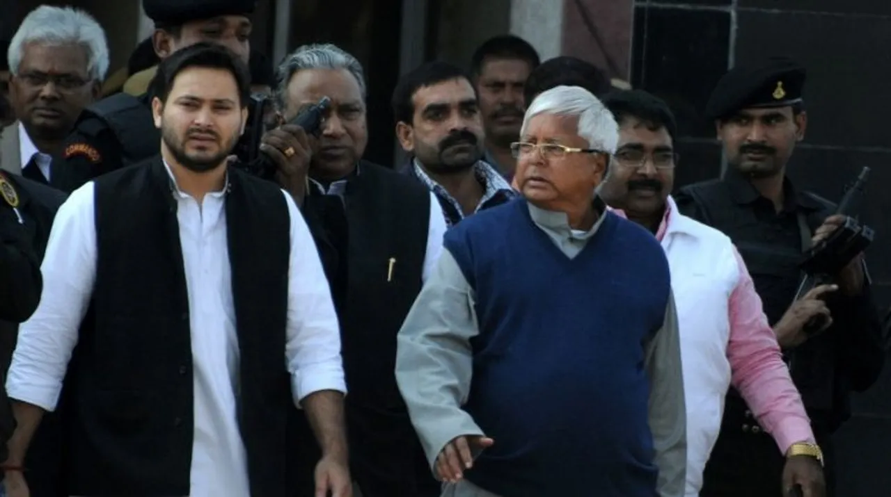  Lalu Prasad Yadav, Tejashwi Yadav Photograph:(AFP) 