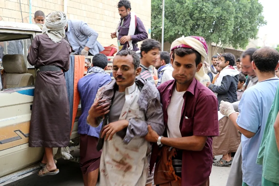  Injured man by air strike in Yemen Photograph:(Reuters) 