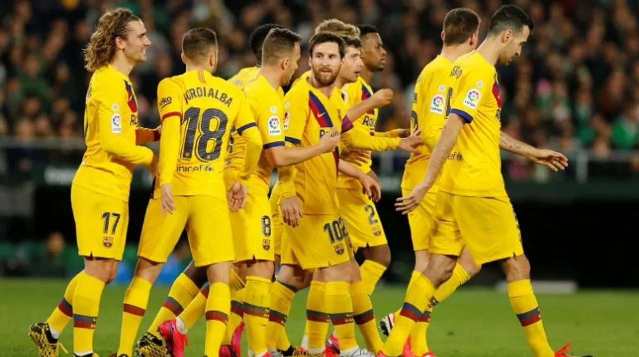  Barcelona's Lionel Messi and teammates celebrate after Clement Lenglet scores their third goal Photograph:(Reuters) 
