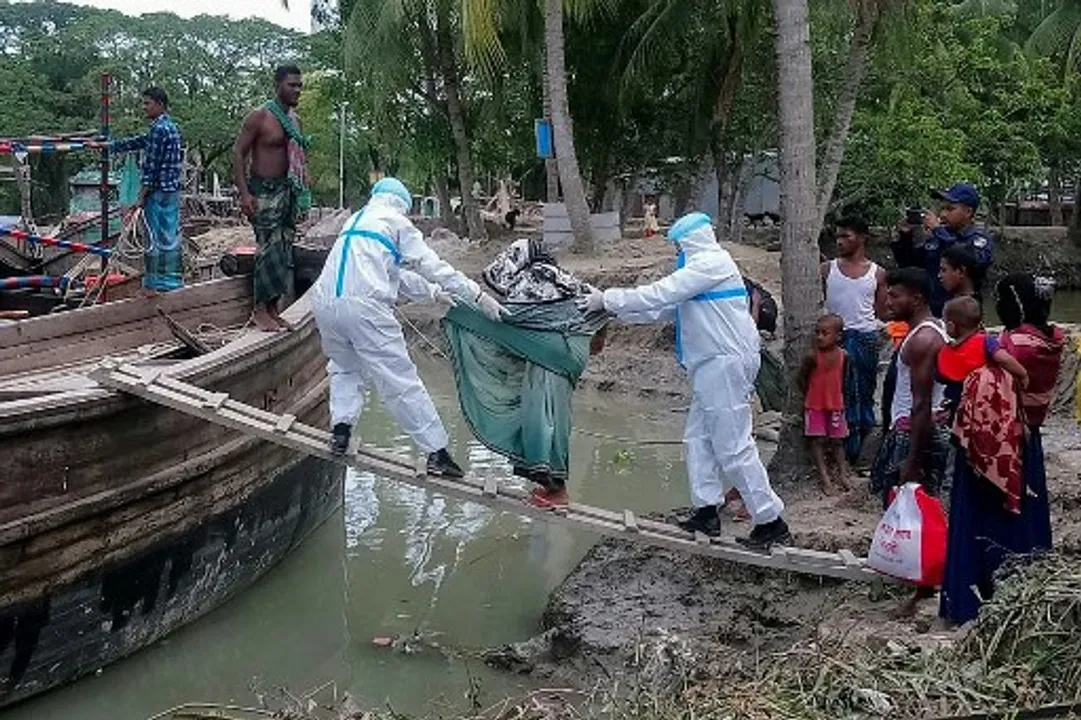  District administration of Bhola shows residents being evacuted in Dhalchar village on the island of Bhola as Cyclone Amphan barrels towards BangladeshÂ coast. Photograph:(AFP) 