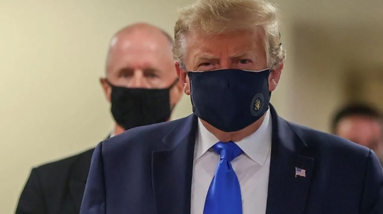  Donald Trump spotted in a face mask on Saturday Photograph:(Reuters) 