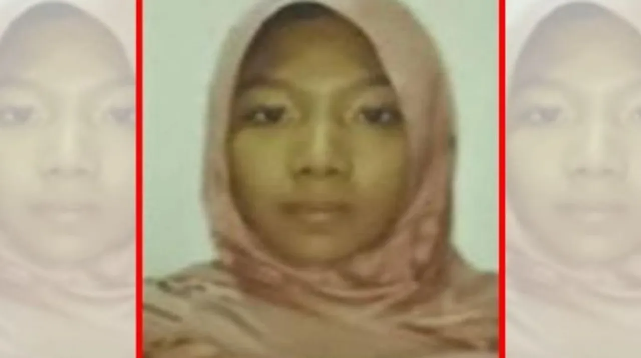 Rezky Fantasya Rullie - the detained woman Photograph:(X) 