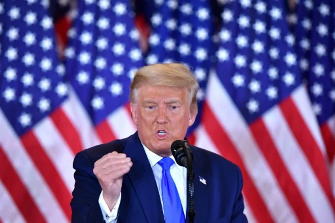  US President Donald Trump speaks during election night in the East Room of the White House in Washington Photograph:(AFP) 