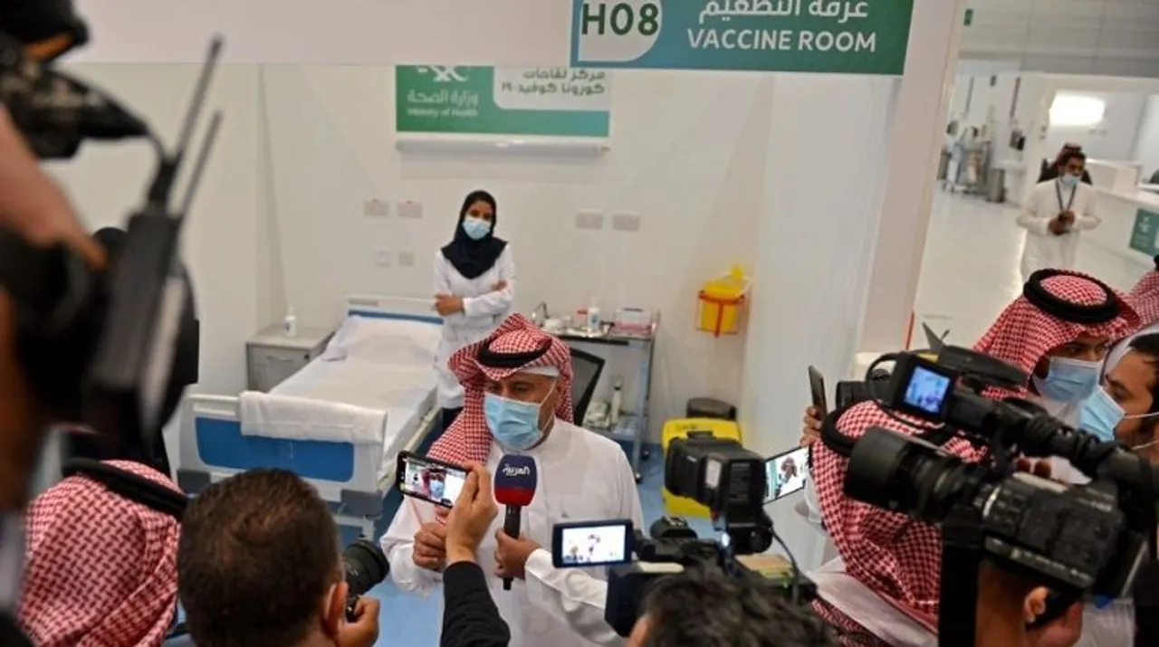  The first Saudi citizen receiving the Pfizer-BioNTech COVID-19 coronavirus vaccine (Tozinameran) speaks to reporters after its administration at a vaccination centre supervised by the health ministry in the capital Riyadh on December 17, 2020. Photograph:(AFP) 