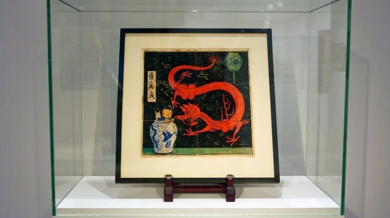  Painting for the original cover of "The Blue Lotus" (Lotus Bleu) Tintin comic book (1936), is displayed before being auctioned by Artcurial in Paris, France Photograph:(Reuters) 