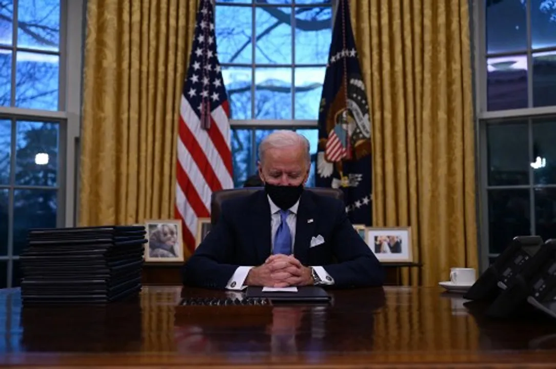  US President Joe Biden sits in the Oval Office at the White House in Washington, DC Photograph:(AFP) 
