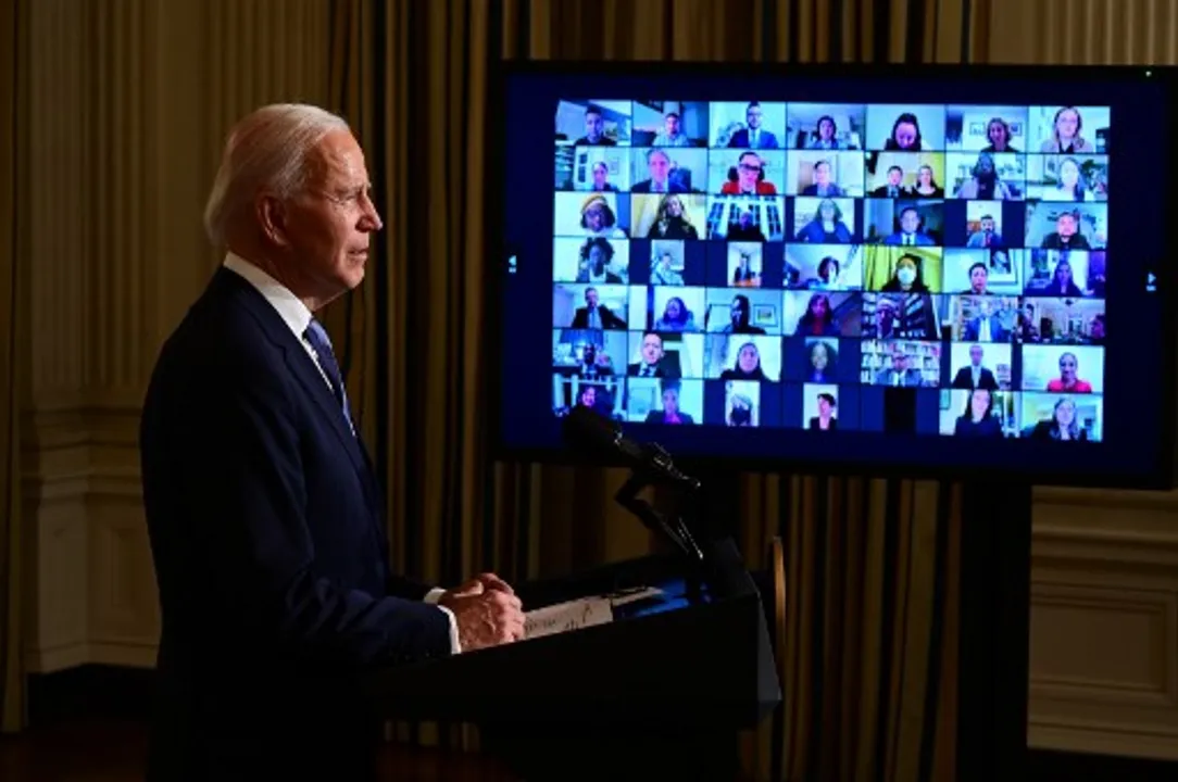  US President Joe Biden swears in presidential appointees during a virtual ceremony in the State Dining Room of the White House in Washington, DC Photograph:(AFP) 