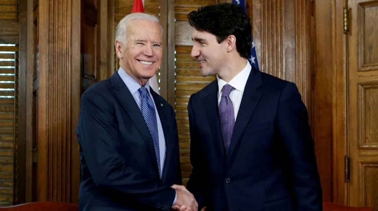  Canada's Prime Minister Justin Trudeau shakes hands with President Joe BidenÂ  Photograph:(Reuters) 