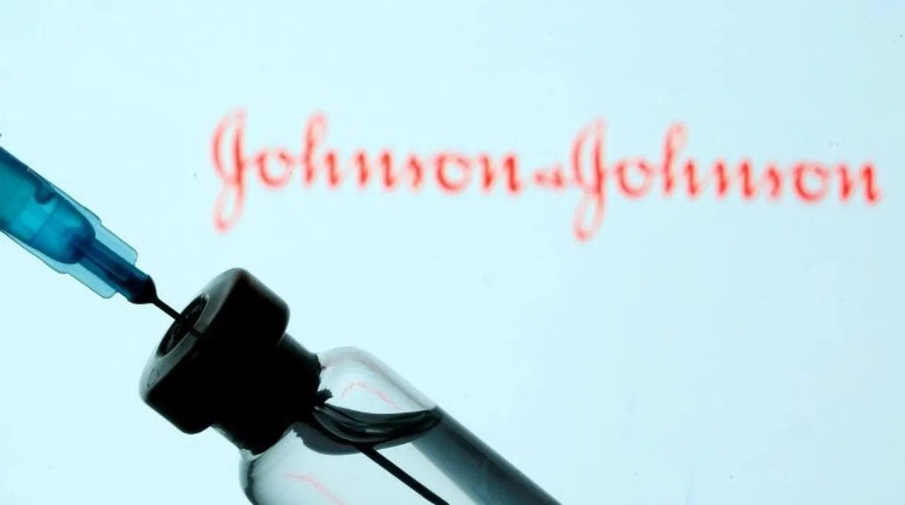  Â A vial and sryinge are seen in front of a displayedÂ Johnson & JohnsonÂ logo in this illustration Photograph:(Reuters) 