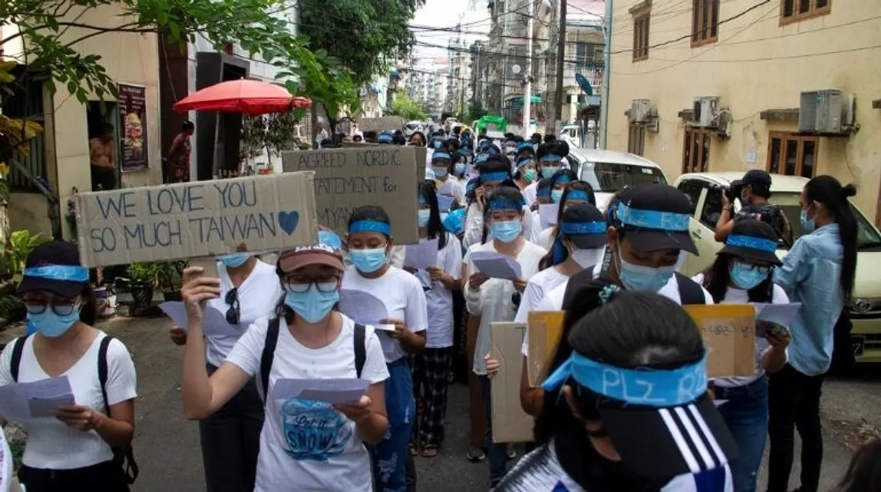  Demonstrators march during a protest against military coup in Yangon, Myanmar April 12, 2021 Photograph:(Reuters) 