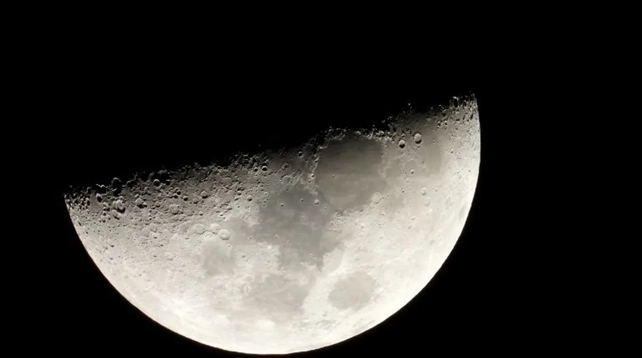  Moon is seen in the sky during the closest visible conjunction of Jupiter and Saturn in 400 years, in Tejeda, on the island of Gran Canaria, Spain December 21, 2020 Photograph:(Reuters) 