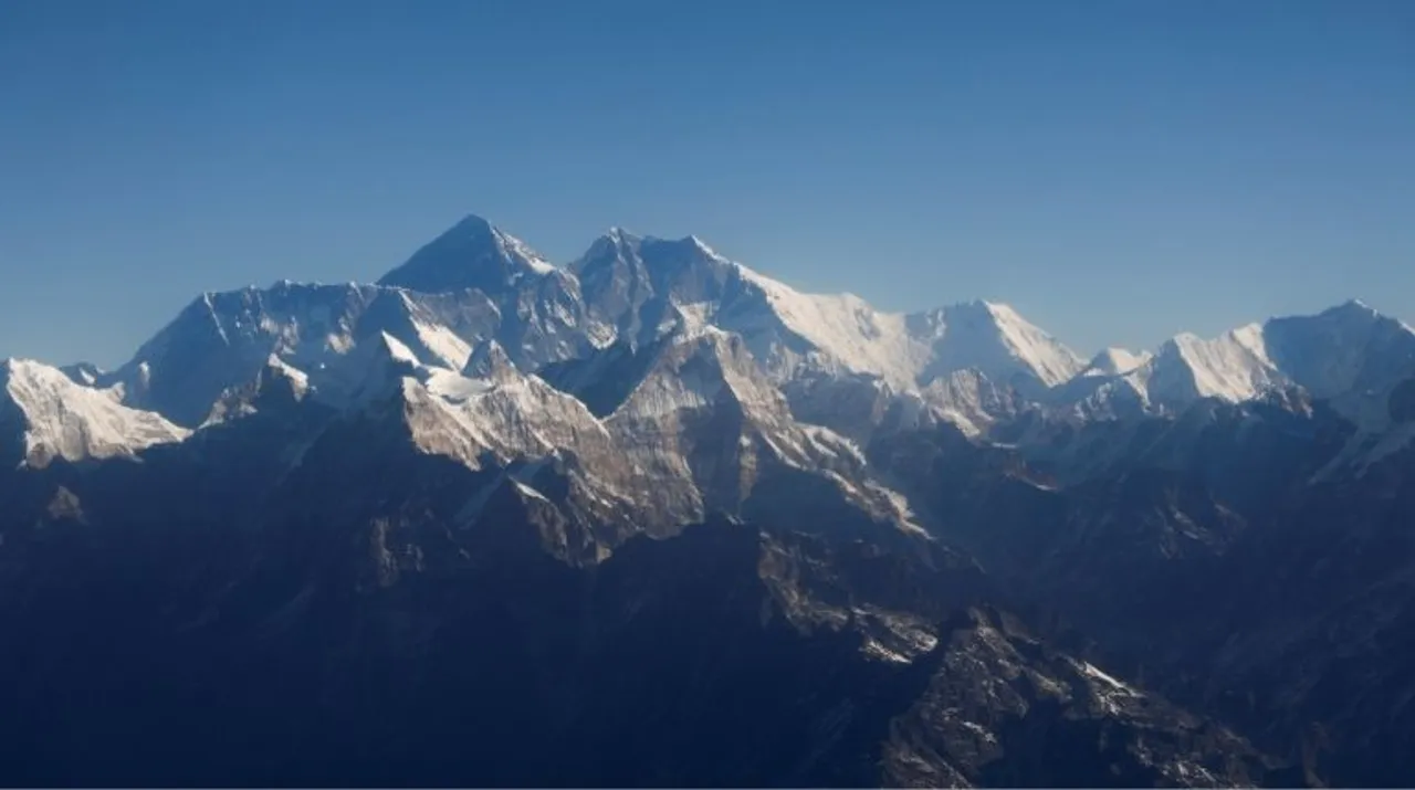  FILE PHOTO: Mount Everest, the world highest peak, and other peaks of the Himalayan range are seen through an aircraft window during a mountain flight from Kathmandu, Nepal January 15, 2020.  Photograph:(Reuters) 