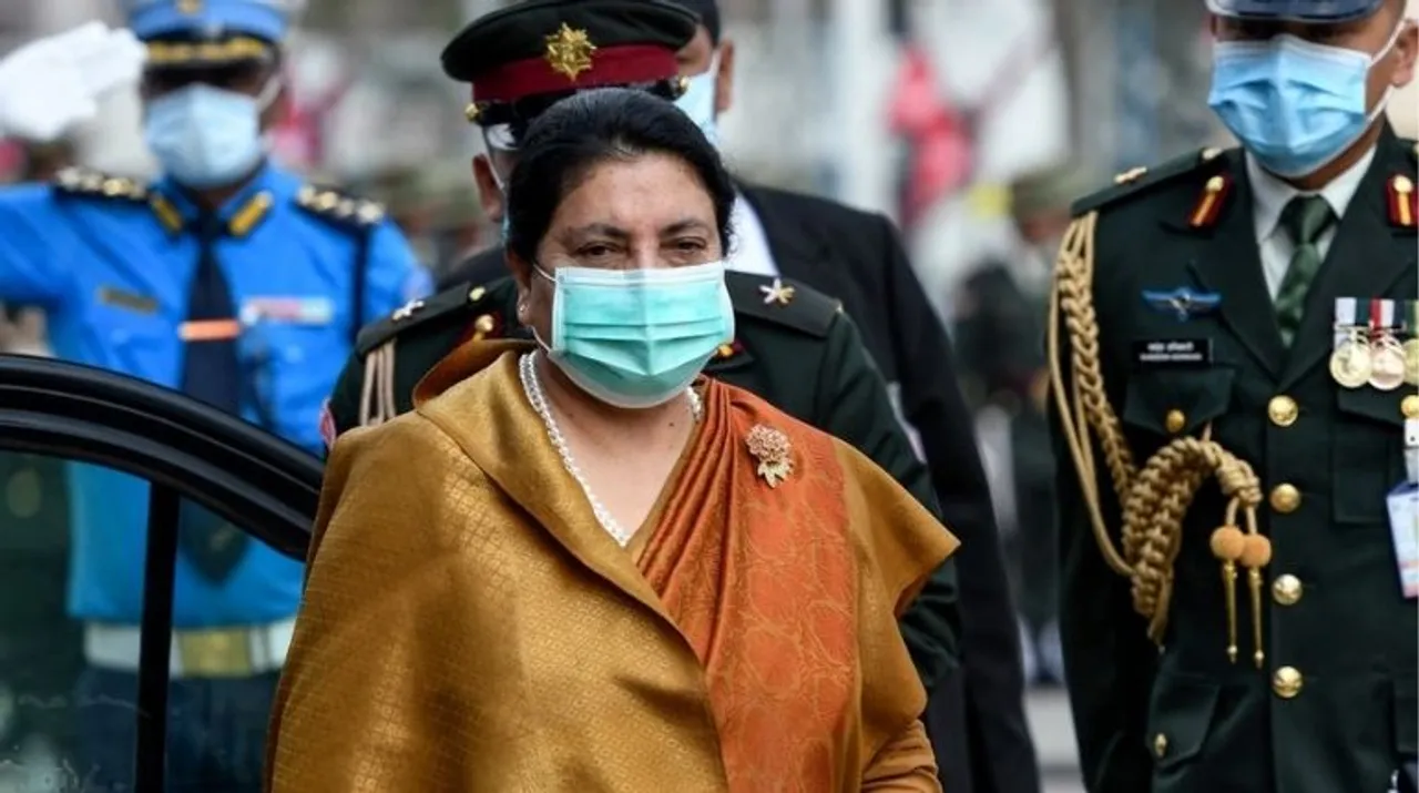  Nepal's President Bidhya Devi Bhandari (C) arrives at the parliament to present the new government's programme for the fiscal year 2020/2021 in Kathmandu on May 15, 2020 Photograph:(AFP) 