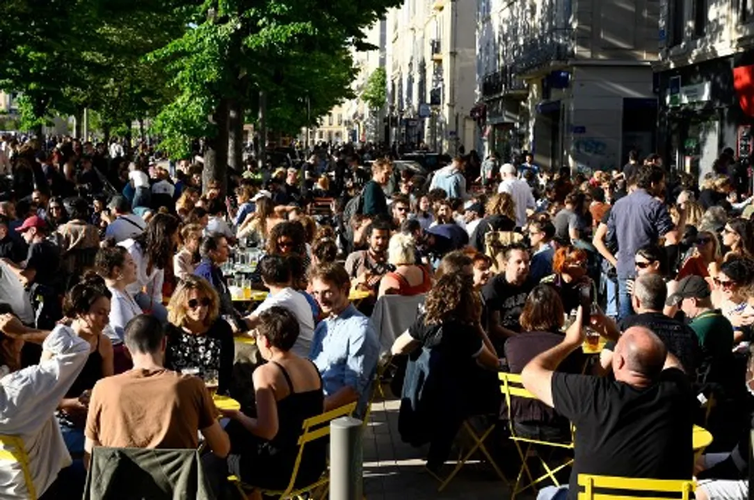  People gather on a terrace of a cafe in Marseille, southern France Photograph:(AFP) 