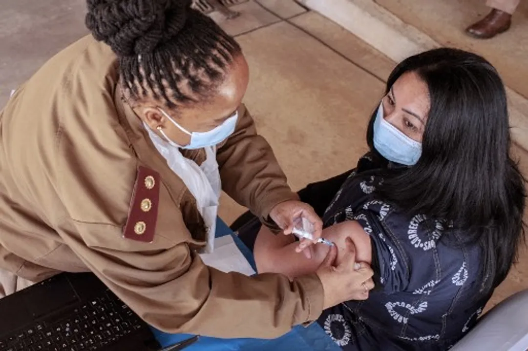  A person receives a vaccine dose at a correctional centre in Johannesburg Photograph:(AFP) 