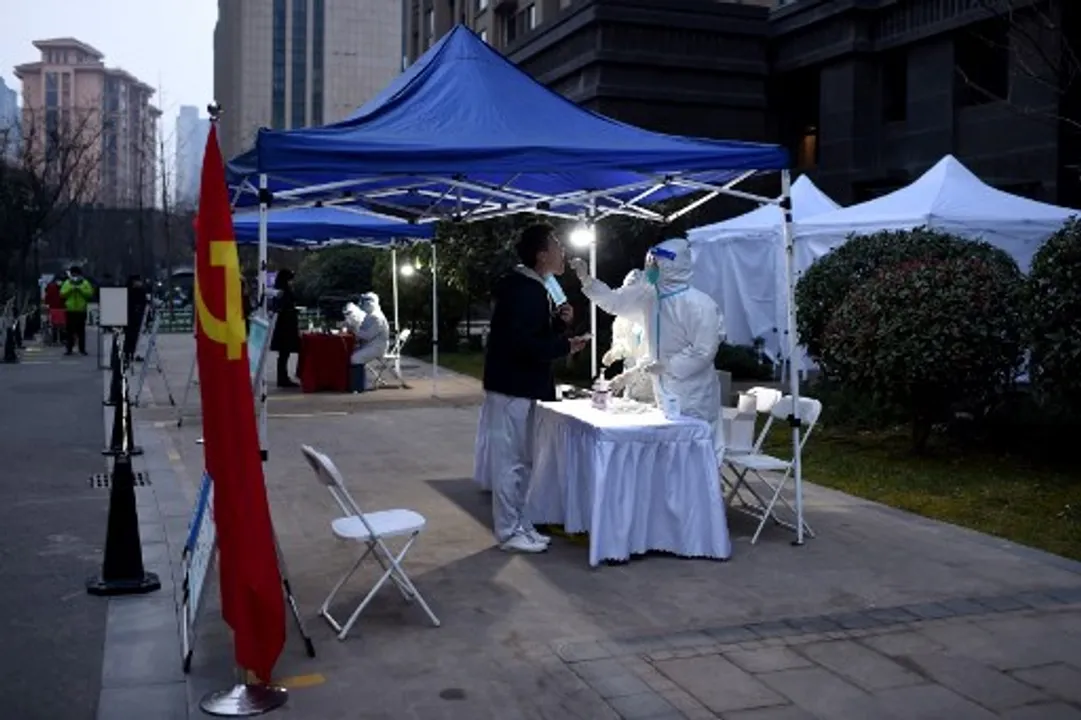  A resident being tested for COVID-19 in China's Xi'an city Photograph:(AFP) 