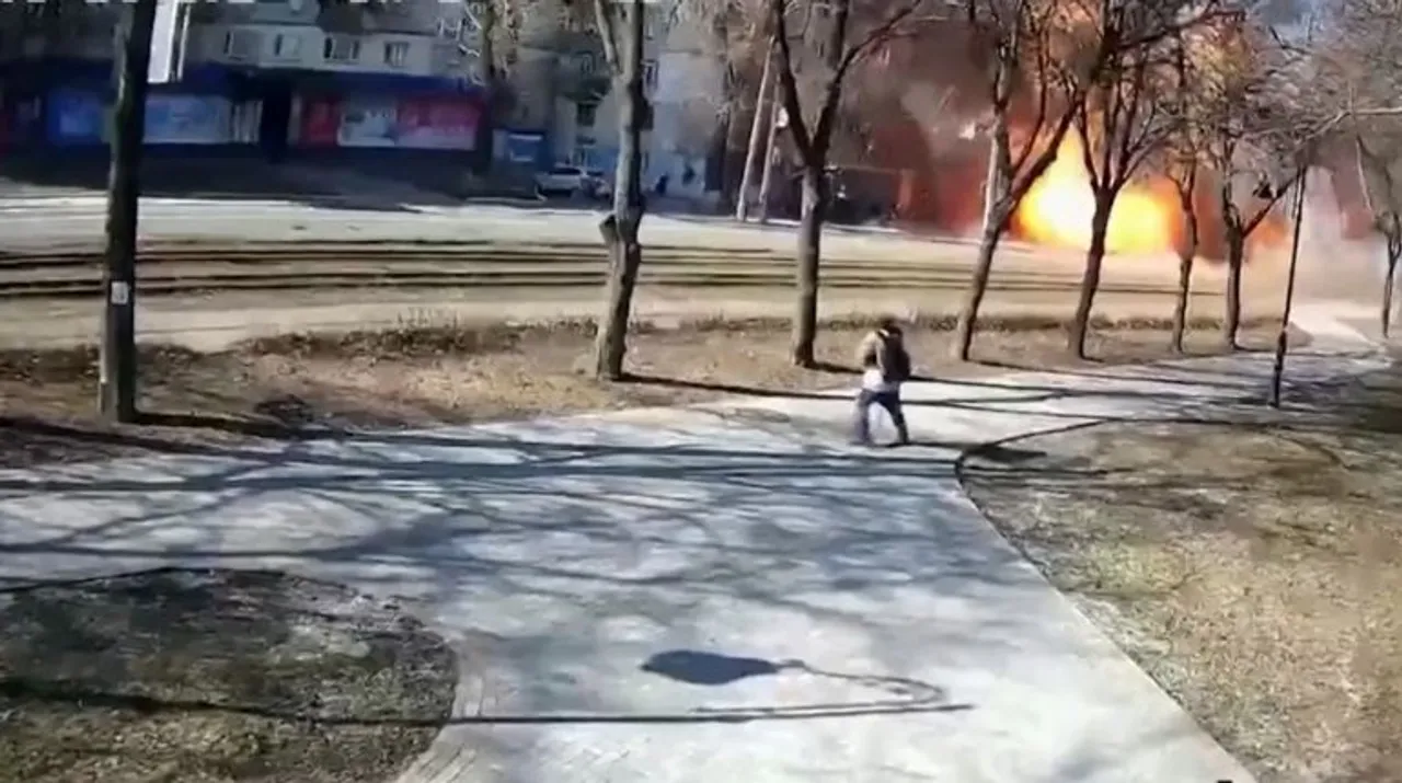  The video posted online shows the moment a missile exploded in a street in Kyiv, right in front of a civilian walking through a park on Kyrylivska Street. In the video, the civilian can be seen recoiling from the shock of the blast and running away from the explosion. Photograph:(WION Web Team) 