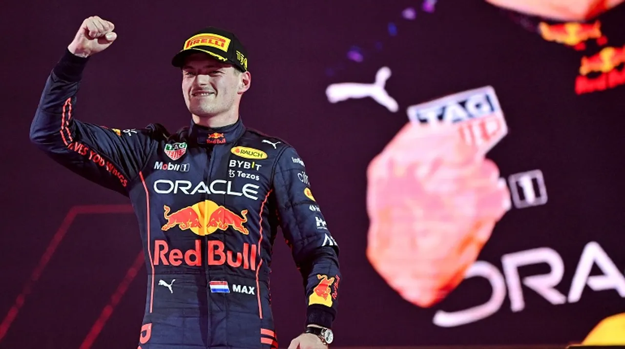  Red Bull's Dutch driver Max Verstappen celebrates on the podium after the 2022 Saudi Arabia Formula One Grand Prix. Photograph:(AFP) 