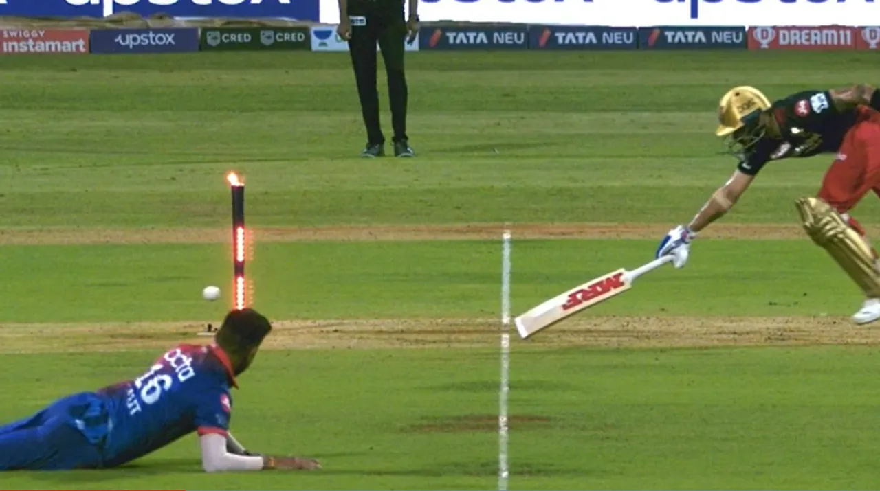  Virat Kohli was sent packing after a stunning throw from Lalit Yadav. Photograph:(X) 