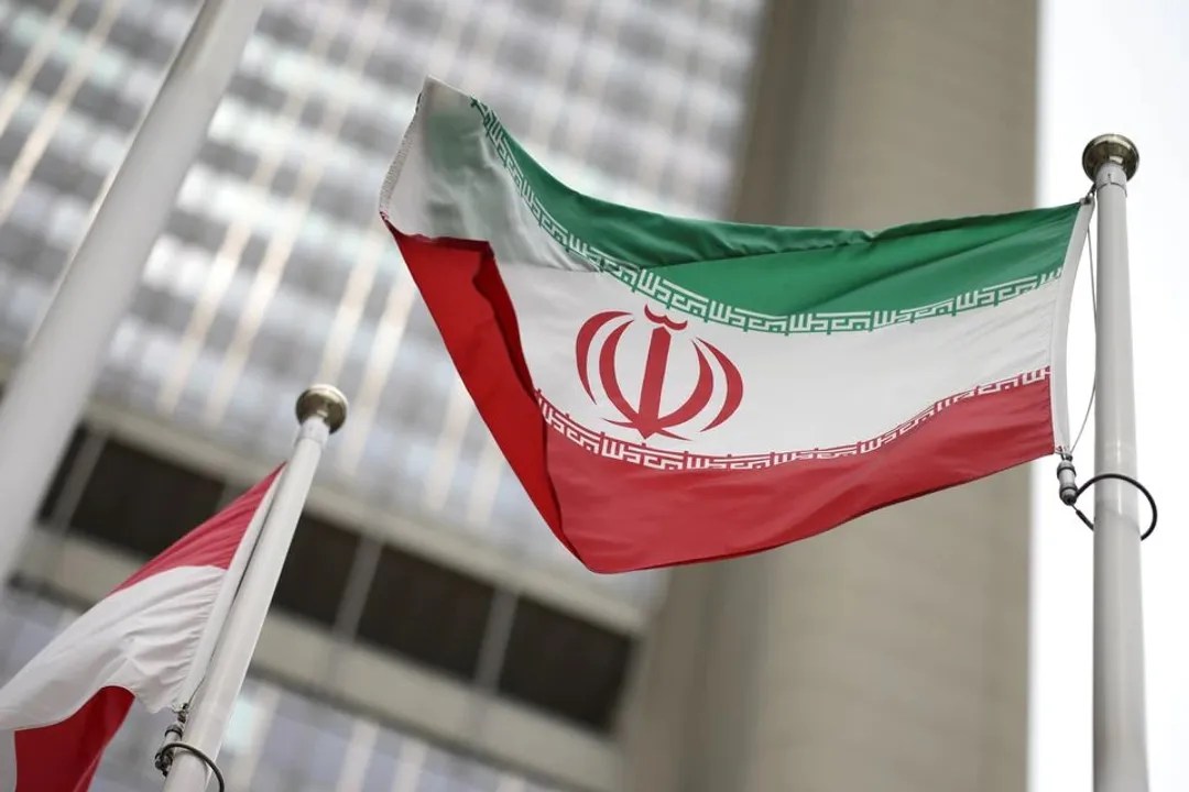  Iranian flag flies in front of the UN office building Photograph:(Reuters) 