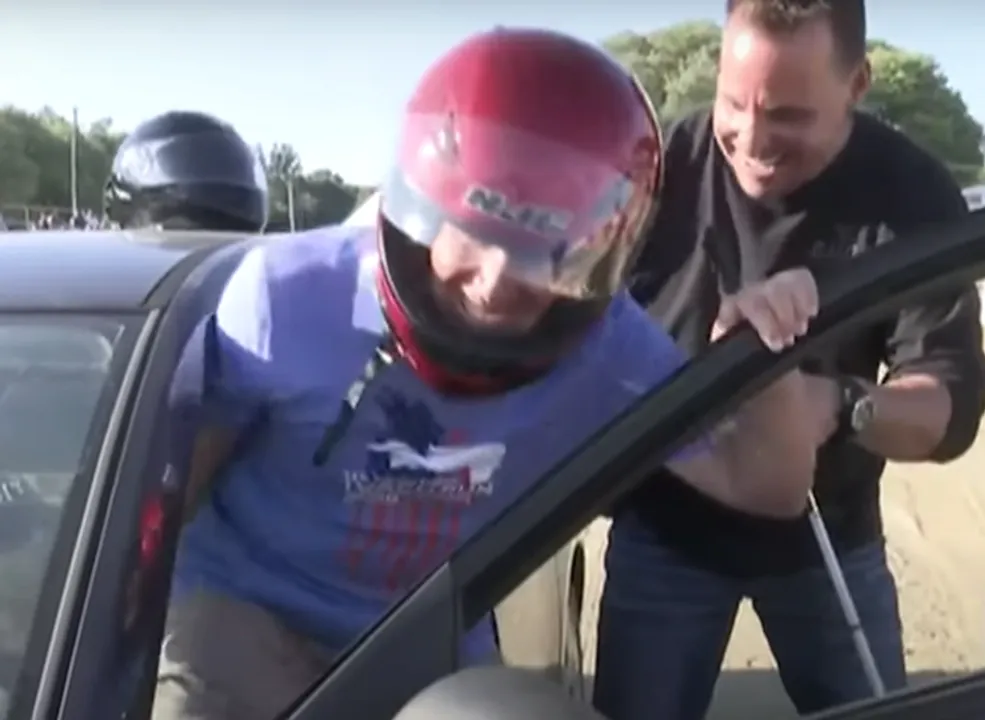  Blind Michigan Justice Richard Bernstein drives for the first time. Photograph:(AFP) 