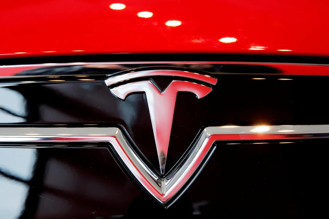  Tesla logo Photograph:(Reuters) 