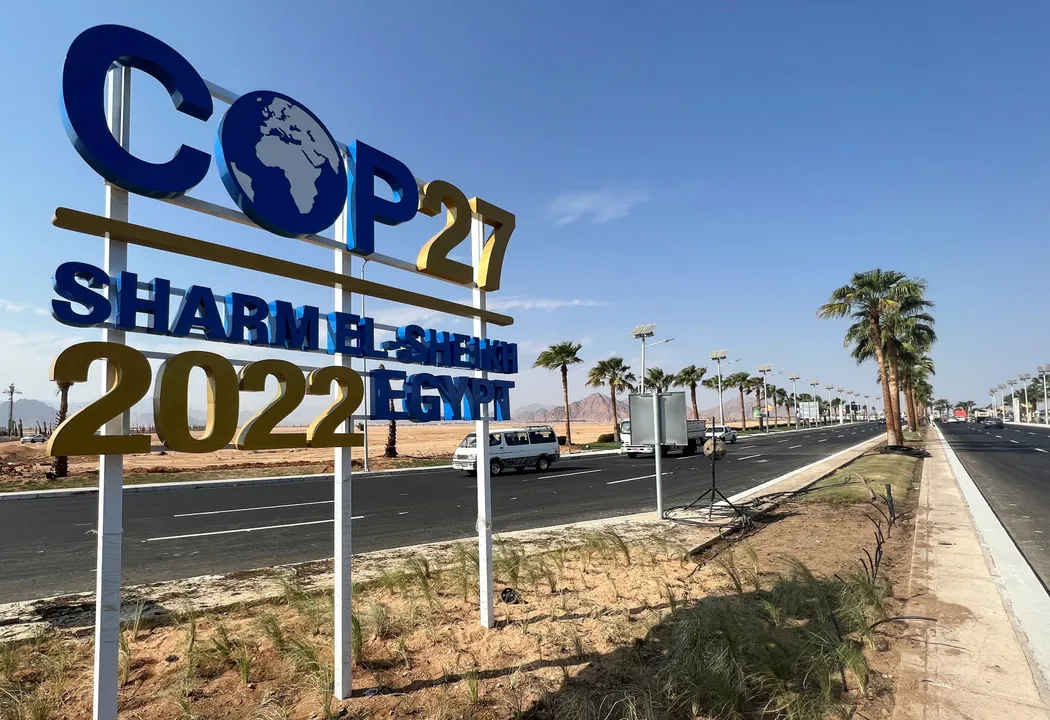  View of a COP27 sign on the road Photograph:(Reuters) 