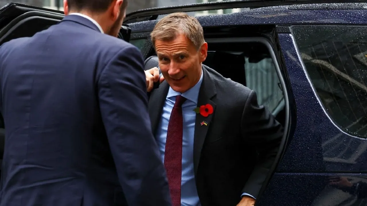   British Chancellor of the Exchequer Jeremy Hunt outside 10, Downing Street Photograph:(Reuters) 