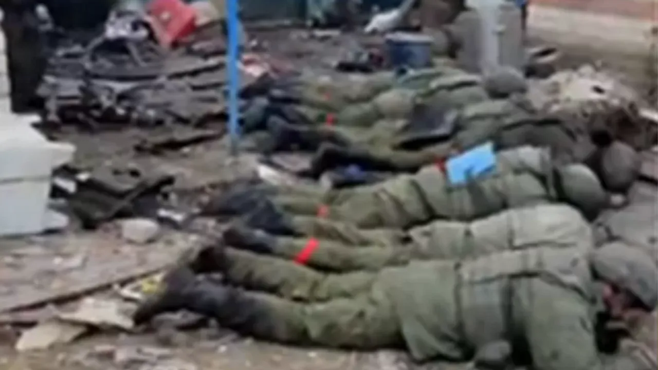  A screengrab of the video showing Russian soldiers surrendering face down into the ground Photograph:(X) 