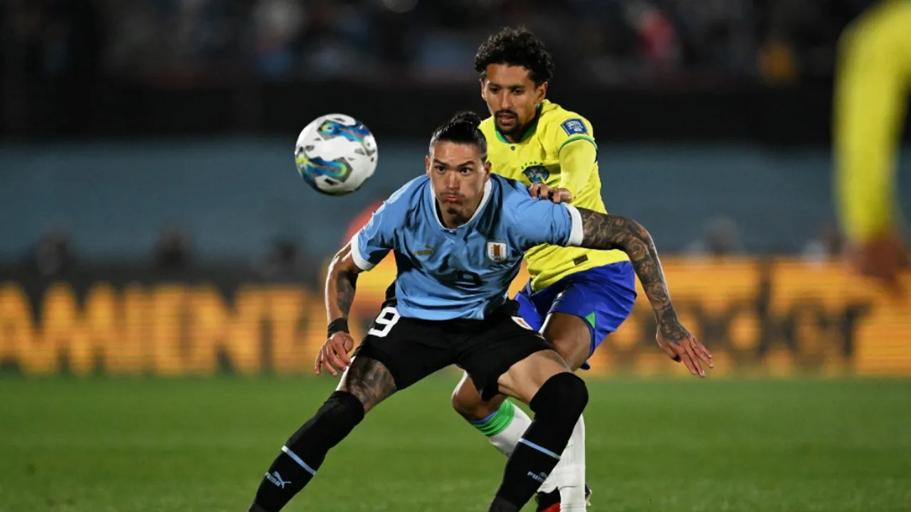  Nunez (blue shirt) vying for the ball during the game vs Brazil Photograph:(AFP) 