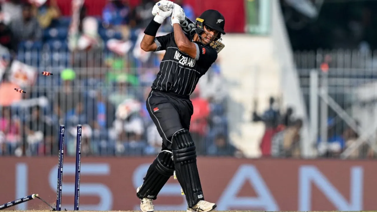  Rachin Ravindra being clean bowled by during AFG vs NZ ODI World Cup 2023 game. Photograph:(AFP) 