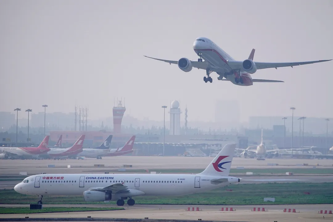 A China Eastern Airlines aircraft and Shanghai Airlines aircraft Photograph:(Reuters) 