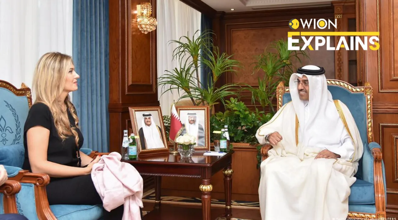  Kaili with Qatari Labor Minister Ali bin Samikh Al Marri Photograph:(Reuters) 