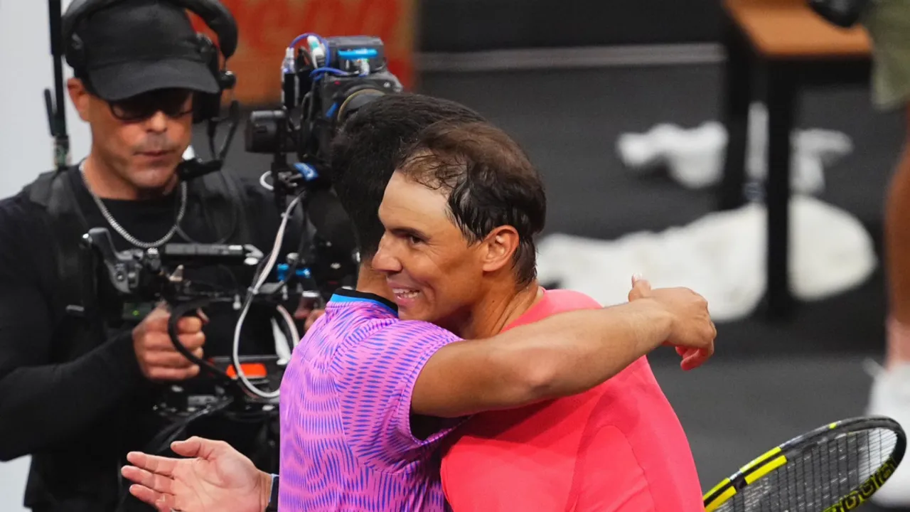  Rafael Nadal (R) and Carlos Alcaraz hug it out after the match (Source: @carlosalcaraz) Photograph:(X) 