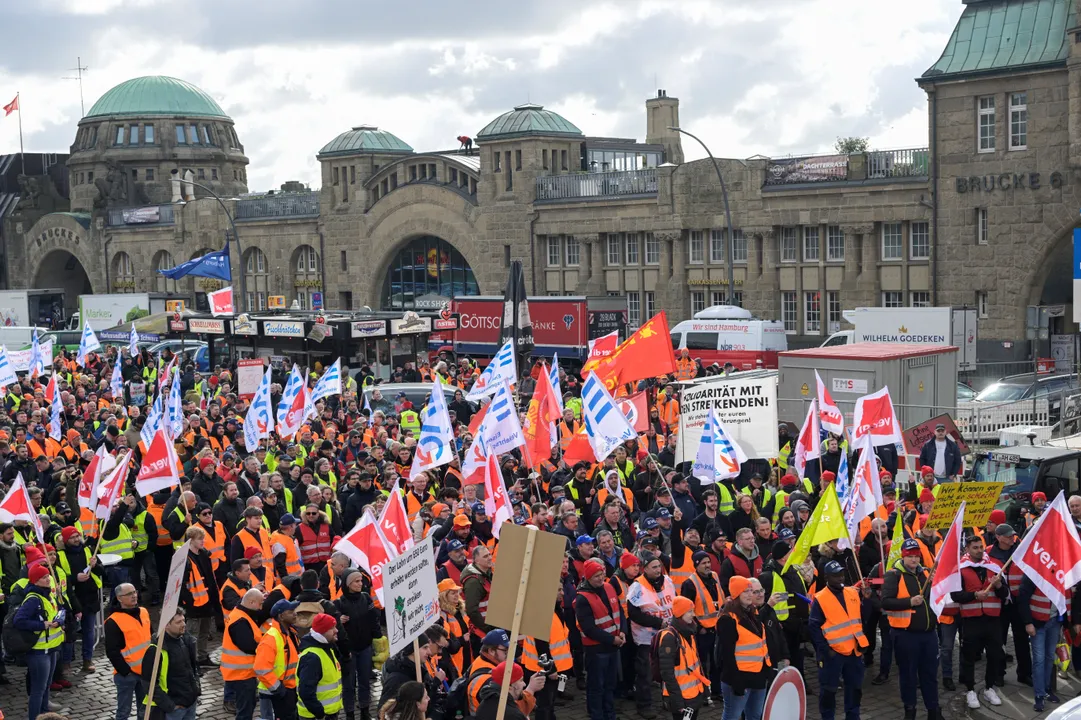  Protestors demonstrate in front of 'Landungsbruecken' at the harbour during a nationwide strike called by the German trade union Verdi over a wage dispute in Hamburg, Germany Photograph:(Reuters) 