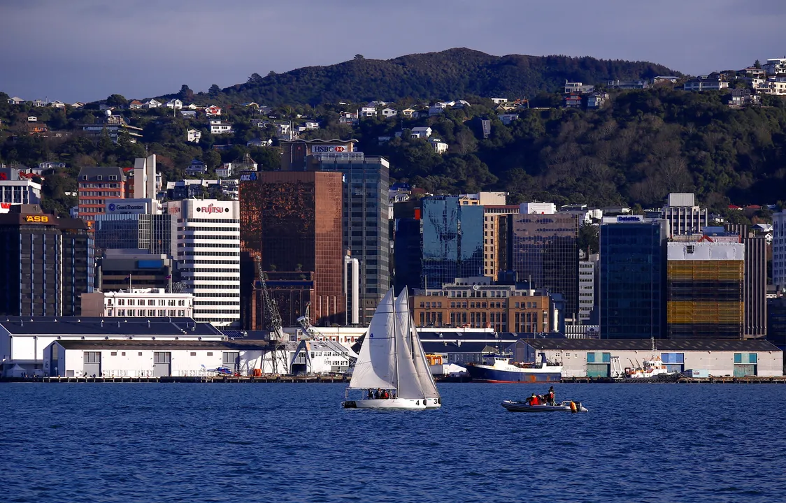  A sailing boat can be seen in front of the central business district (CBD) of Wellington in New Zealand Photograph:(Reuters) 