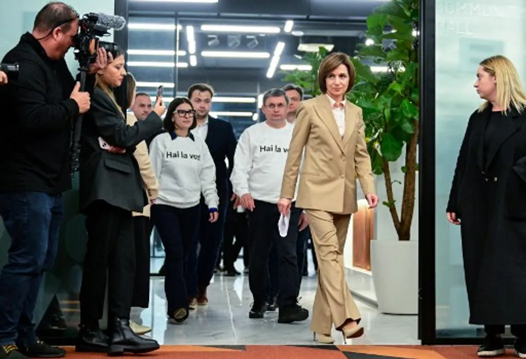  Moldova's President Maia Sandu arrives for a press conference at her campaign headquarters in Chisinau October 21, 2024. Photograph:(AFP) 