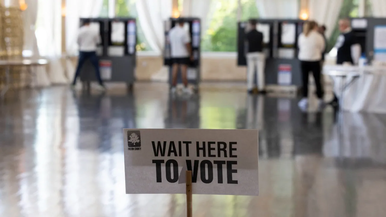  A 19-year-old first-time voter, Phoebe Bezabih, becomes the last voter to cast her ballot in Georgia's polling station. She voted for Kamala Harris as she aligned with her policies more than Republican Donald Trump Photograph:(Reuters) 