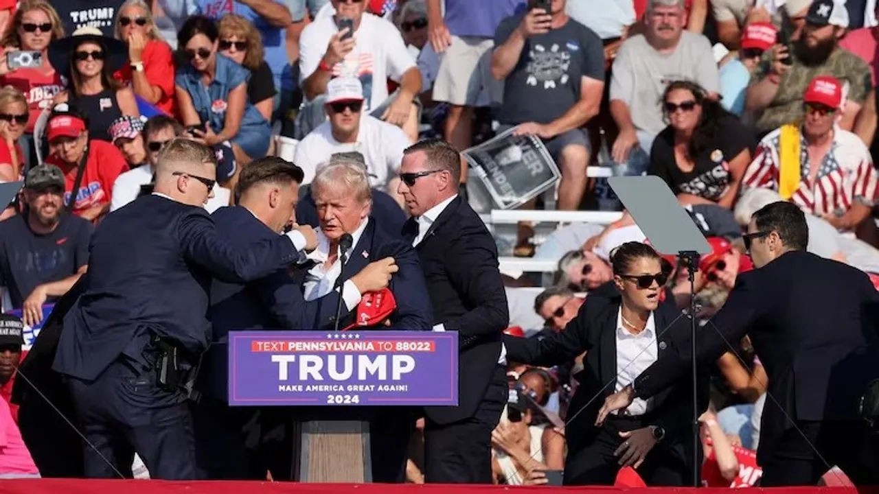  Trump moments after being shot at in July during a campaign rally Photograph:(Reuters) 