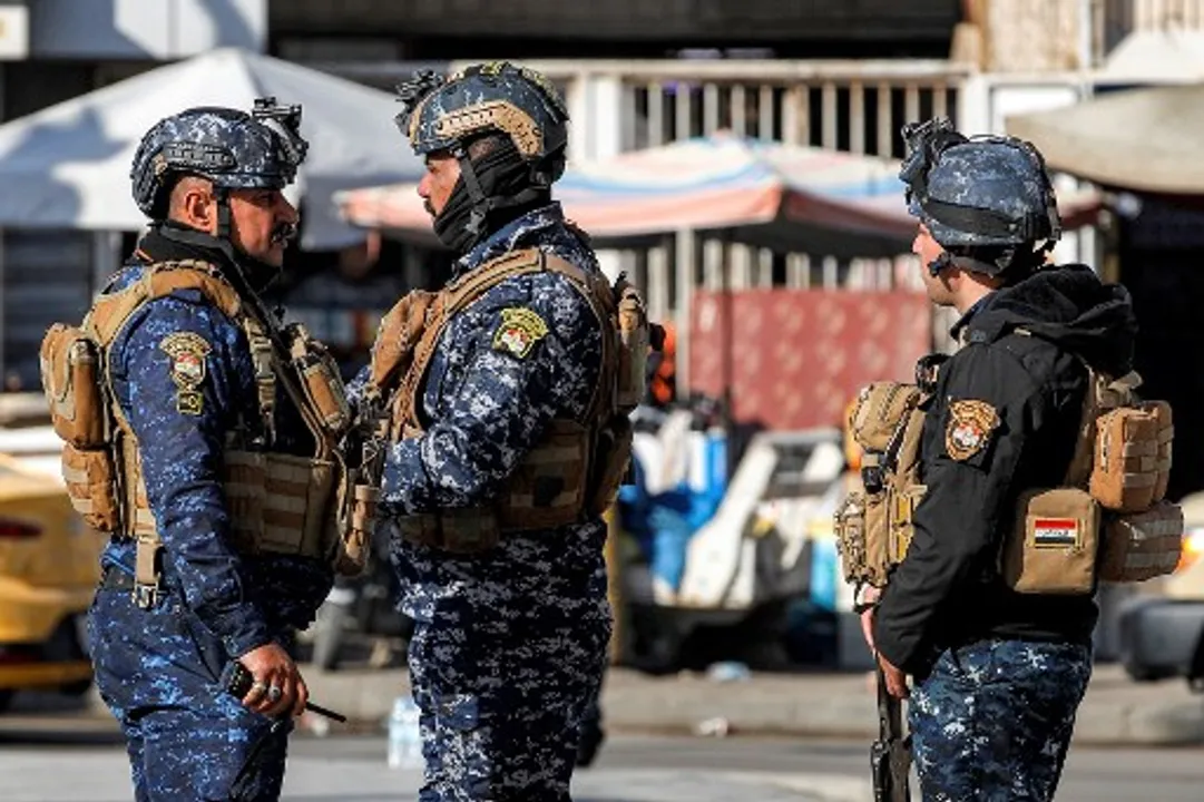  Iraqi security forces' are stationed by the Freedom Monument in Baghdad's Tahrir Square on December 26, 2023.  Photograph:(AFP) 