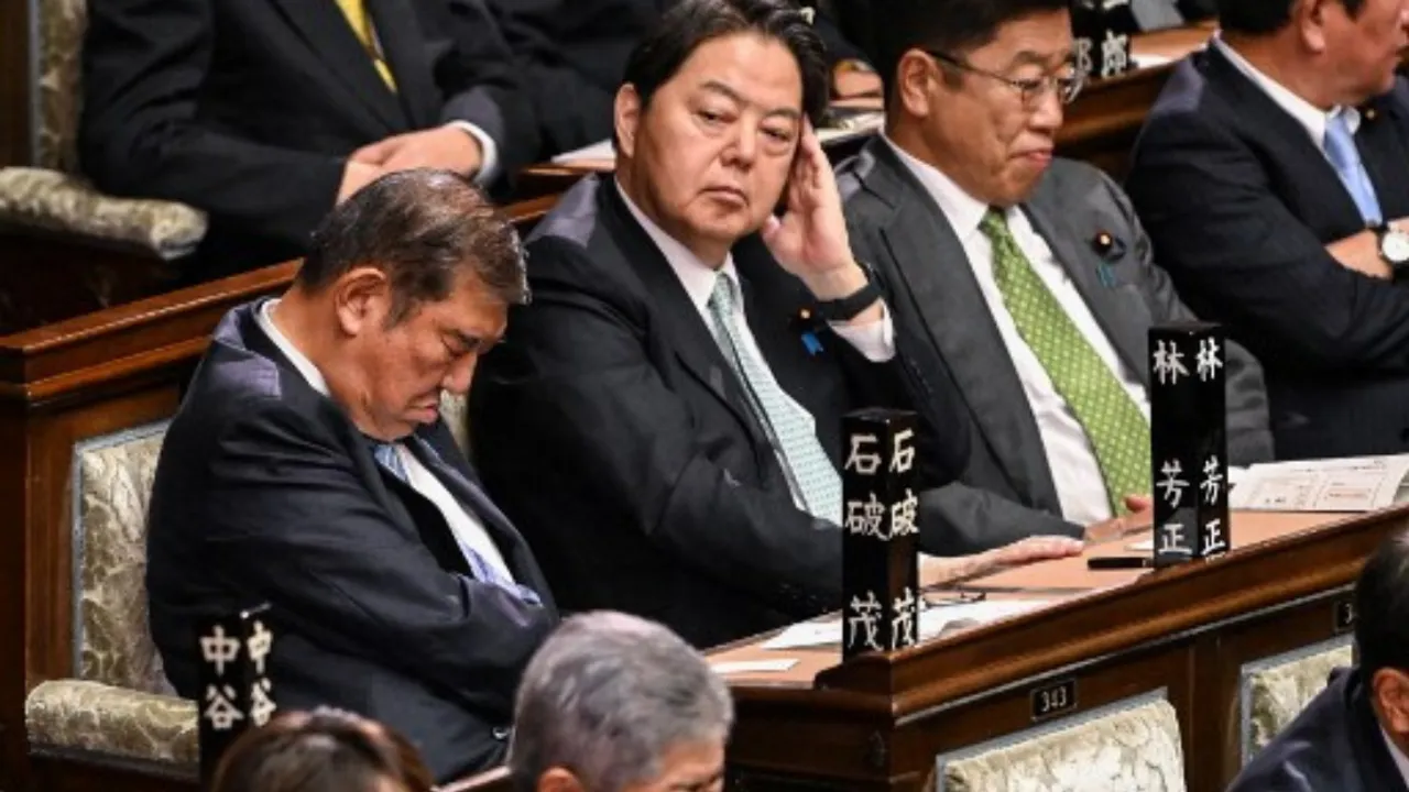  Japan's Prime Minister seen sleeping in parliament Photograph:(AFP) 