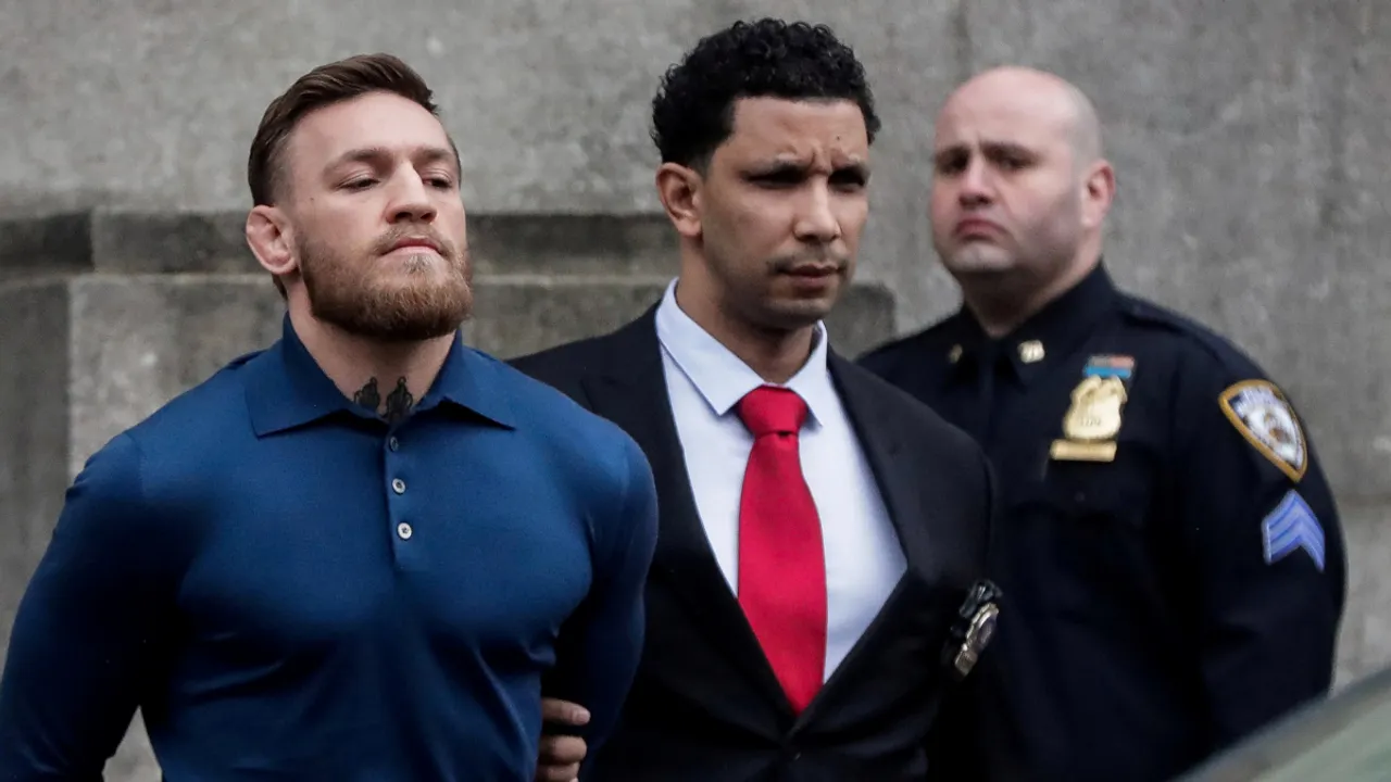  MMA fighter Conor McGregor walks out of the 78th police precinct. Photograph:(Reuters) 